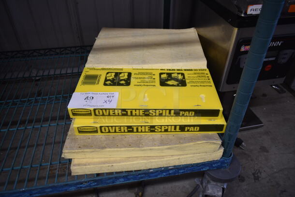 4 Packs of BRAND NEW! Over the Spill Absorbent Pads. 4 Times Your Bid!