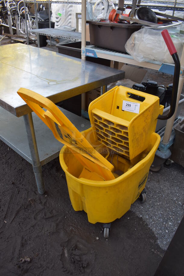 Rubbermaid Yellow Poly Mop Bucket w/ Wringing Attachment and Wet Floor Caution Sign on Commercial Casters. 15x24x36 - Image 1 of 4