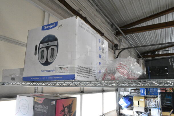 4 IN ORIGINAL BOX! Items Including Lifepro Sonic LX Percussion Massage Gun, Pyle Speaker, Tranqwil Foot Massager, Miko Foot Massager. 4 Times Your Bid!  - Image 1 of 9