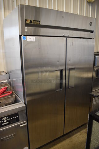 True TG2R-2S ENERGY STAR Stainless Steel Commercial 2 Door Reach In Cooler on Commercial Casters. 115 Volts, 1 Phase. 50x34x83. Tested and Does Not Power On