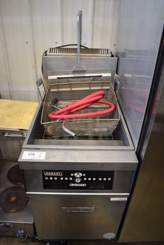 Hobart Stainless Steel Commercial Floor Style Natural Gas Powered Deep Fat Fryer w/ Metal Fry Basket and Filtration System on Commercial Casters. 150,000 BTU. 21x35x57