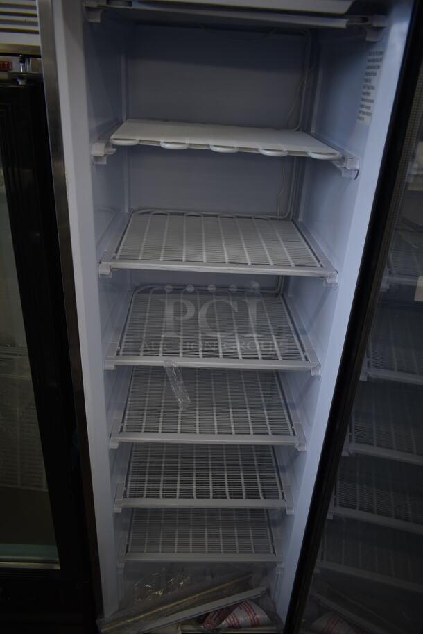 BRAND NEW SCRATCH AND DENT! KoolMore KM-FMD12SGD Metal Commercial Single Door Reach In Freezer Merchandiser w/ Poly Coated Racks. 115 Volts, 1 Phase. Tested and Working! - Image 4 of 5