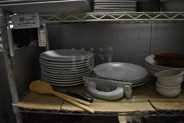 White Finish 5 Tier Shelving Unit w/ Contents Including White Ceramic Dishes, Baskets, Utensils. 48x18x74. BUYER MUST REMOVE. BUYER MUST DISMANTLE. PCI CANNOT DISMANTLE FOR SHIPPING. PLEASE CONSIDER FREIGHT CHARGES. (kitchen) - Image 5 of 11