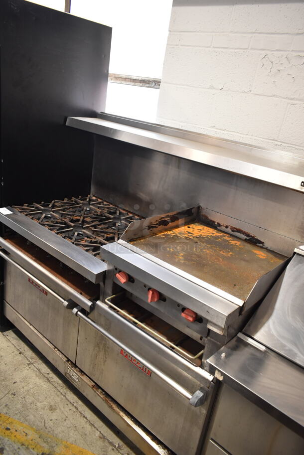 Vulcan VG260 Stainless Steel Commercial Natural Gas Powered 6 Burner Range w/ Right Side Flat Top Griddle, 2 Ovens, Over Shelf and Back Splash on Commercial Casters.   - Image 2 of 11