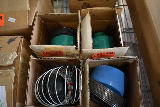 4 BRAND NEW IN BOX! Compressed Springs. 4 Times Your Bid!