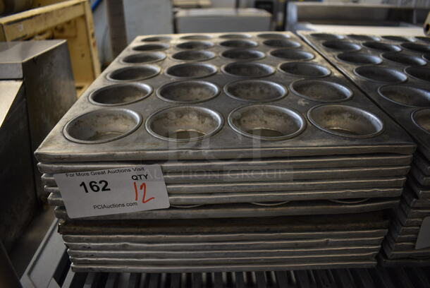 12 Metal 24 Cup Muffin Baking Pans. 14x21x2. 12 Times Your Bid!