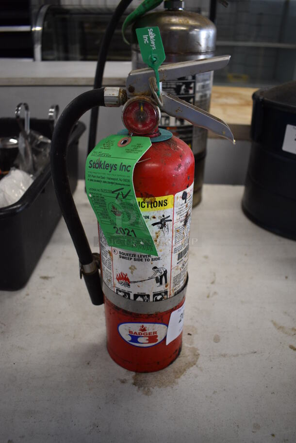 Badger Fire Extinguisher. 4x4x15