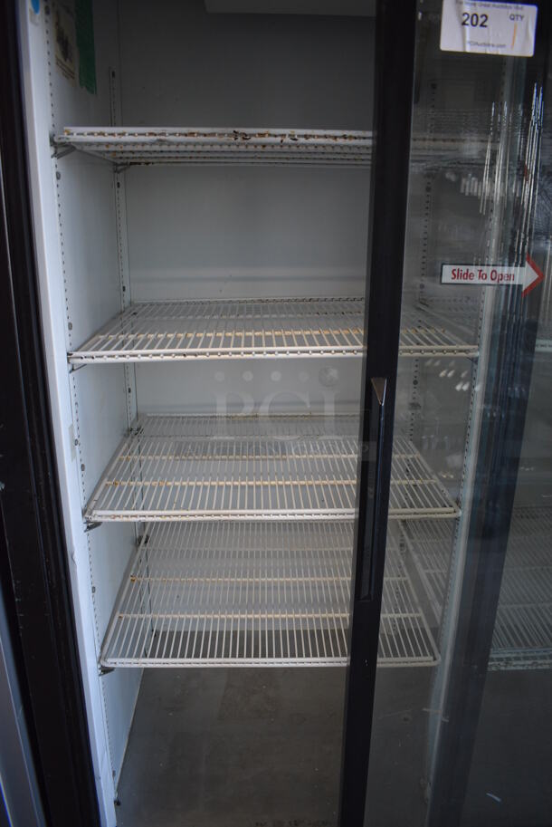True Model GDM-45 Metal Commercial 2 Door Cooler Merchandiser w/ Sliding Doors and Poly Coated Racks on Commercial Casters. 115 Volts, 1 Phase. 51.5x31x82.5. Tested and Working! - Image 5 of 6