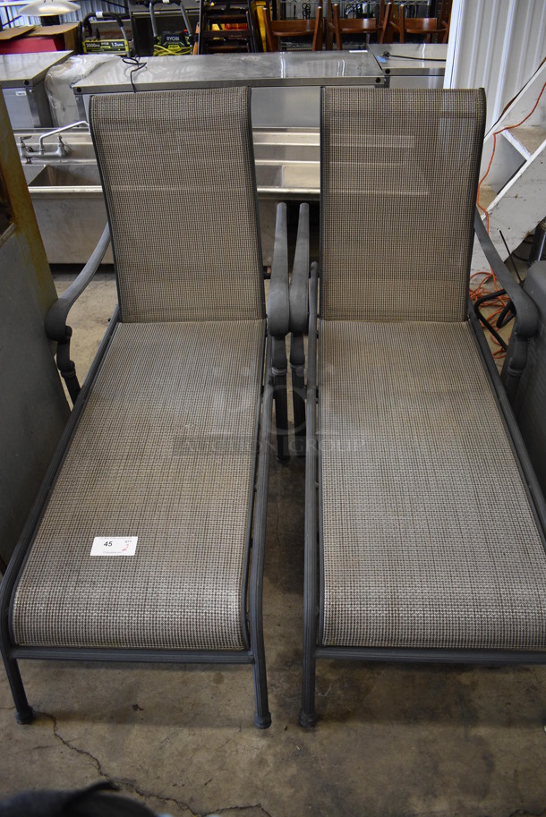 2 Gray Chaise Patio Chairs w/ Arm Rests. 28x64x43. 2 Times Your Bid!