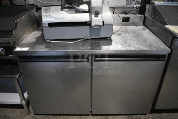 Delfield Model ST4048 Stainless Steel Commercial 2 Door Work Top Cooler w/ Backsplash on Commercial Casters. 115 Volts, 1 Phase. 48x29x36. Tested and Working!