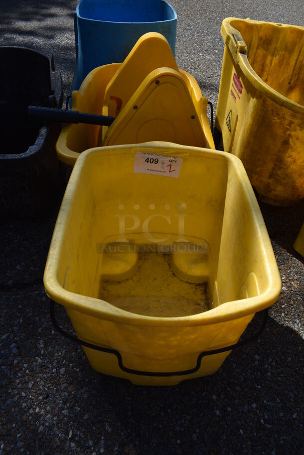 2 Various Yellow Mop Buckets w/ 1 Wringing Attachment. Includes 14x17x12.5. 2 Times Your Bid!