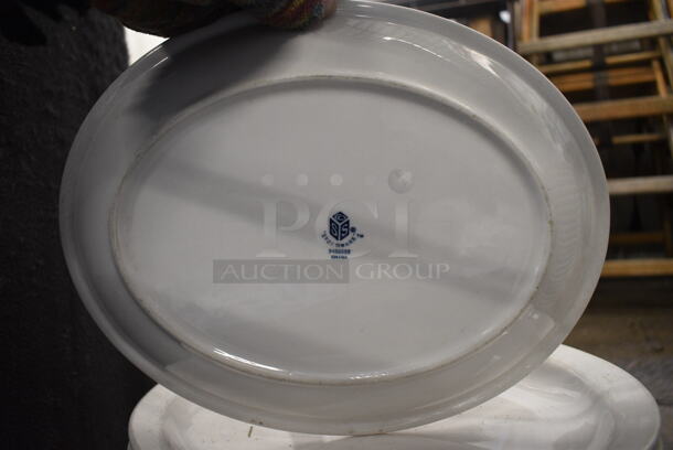 11 White Ceramic Oval Plates. 11.5x9x1. 11 Times Your Bid! - Image 3 of 3