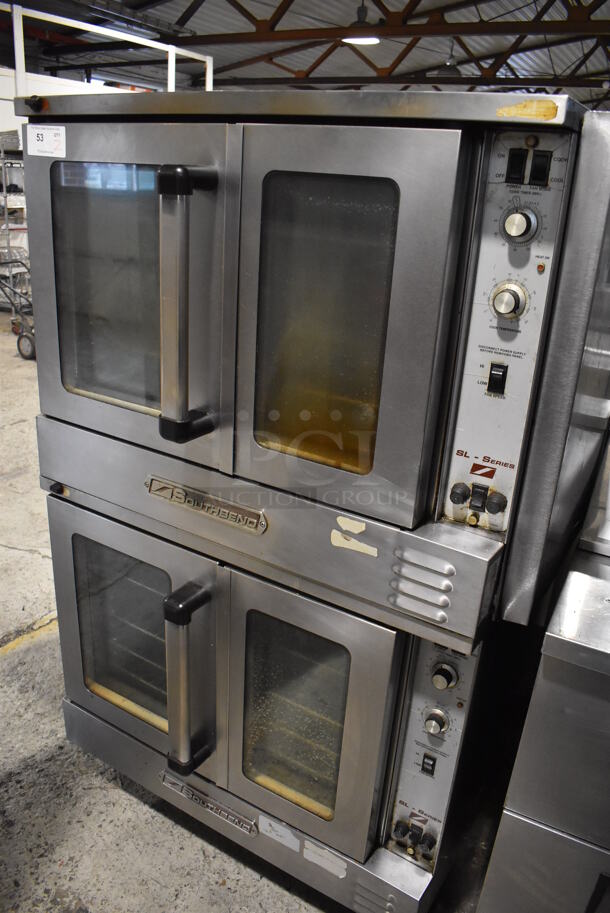 2 Southbend SL Series Stainless Steel Commercial Electric Powered Full Size Convection Ovens w/ View Through Doors, Metal Oven Racks and Thermostatic Controls on Commercial Casters. 208-250 Volts. 41x31x64. 2 Times Your Bid!