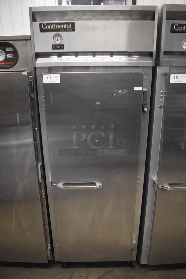 Continental 1RE Stainless Steel Commercial Single Door Reach In Cooler on Commercial Casters. 115 Volts, 1 Phase. 28.5x36x77.5. Tested and Working!