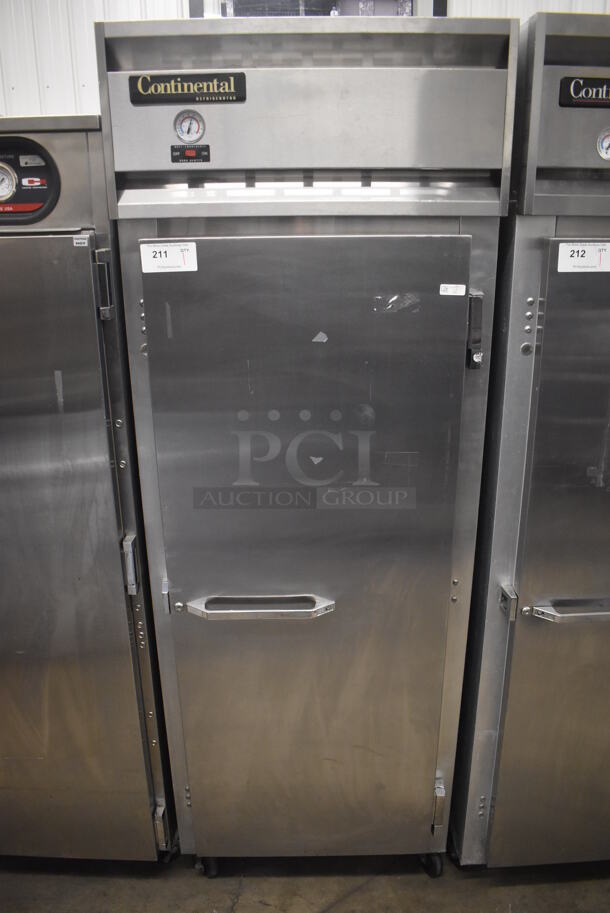 Continental 1RE Stainless Steel Commercial Single Door Reach In Cooler on Commercial Casters. 115 Volts, 1 Phase. 28.5x36x77.5. Tested and Working! - Image 1 of 6