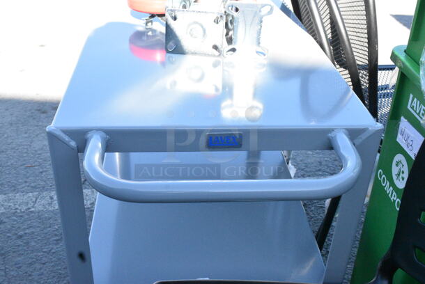 BRAND NEW SCRATCH AND DENT! Lavex Gray Metal 3 Tier Cart w/ Commercial Casters.  - Image 4 of 5