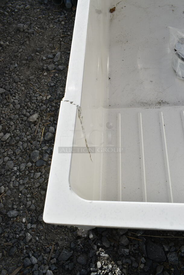 BRAND NEW SCRATCH AND DENT! Zurn Elkay Z1996-36-AW White Composite Mop Sink with Drain Shelf - 36" x 24" x 10". See Pictures For Crack.  - Image 4 of 5