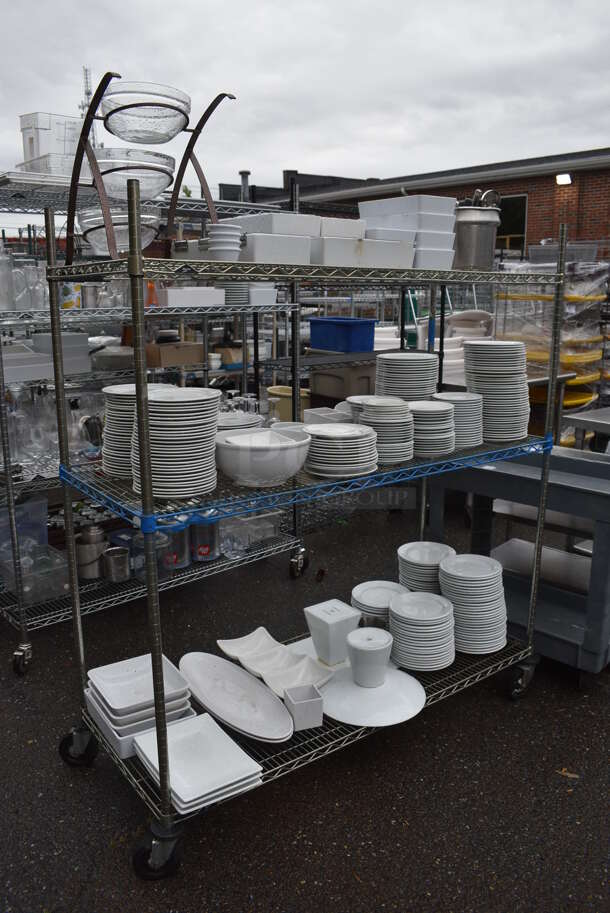 ALL ONE MONEY! Lot of 4 Tiers of Various Smallwares Including White Ceramic Dishes, 3 Tier Stand. Does Not Include Shelving Unit