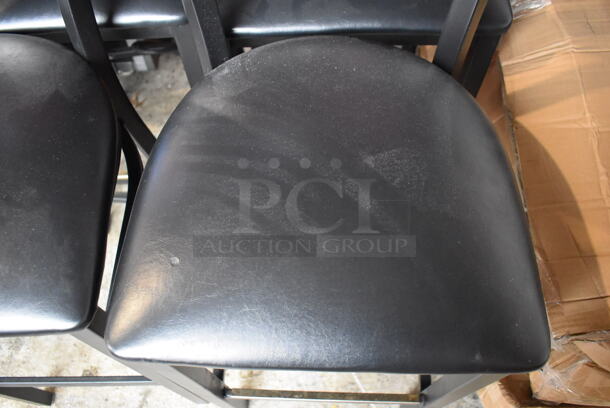 2 Black Metal Bar Height Chairs w/ Wood Pattern Back Rest and Black Seat Cushion. 18x18x43. 2 Times Your Bid! - Image 3 of 5