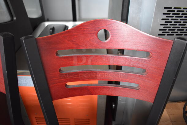 2 Black Metal Bar Height Chairs w/ Wood Pattern Back Rest and Black Seat Cushion. 18x18x43. 2 Times Your Bid! - Image 4 of 5