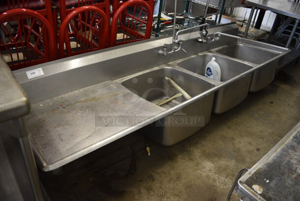Stainless Steel Commercial 3 Bay Sink w/ Left Side Drainboard, 2 Faucets, 2 Handle Sets and Spray Nozzle Attachment. 110x30x25. Bays 24x24x12. Drainboards 30x25x1