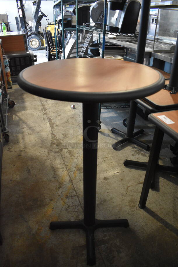 2 Circular Tables With Faux Wood Top on Cross Base Plate. Cosmetic Condition May Vary.  2 Times Your Bid! 