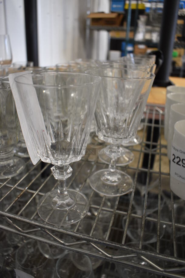 7 Footed Beverage Glasses. 3.5x3.5x7. 7 Times Your Bid!
