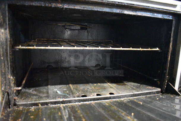 Garland SunFire Stainless Steel Commercial Natural Gas Powered 6 Burner Range w/ Flat Top Griddle, 2 Ovens, Over Shelf and Back Splash on Commercial Casters. 61x33x60 - Image 6 of 8