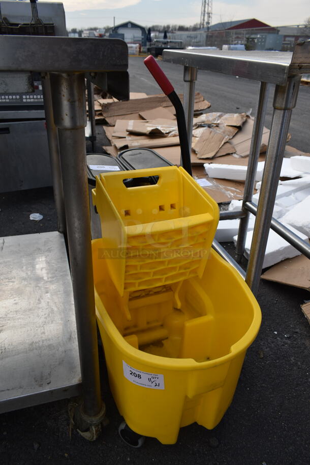 Rubbermaid Yellow Poly Mop Bucket w/ Wringing Attachment on Casters. - Image 2 of 3