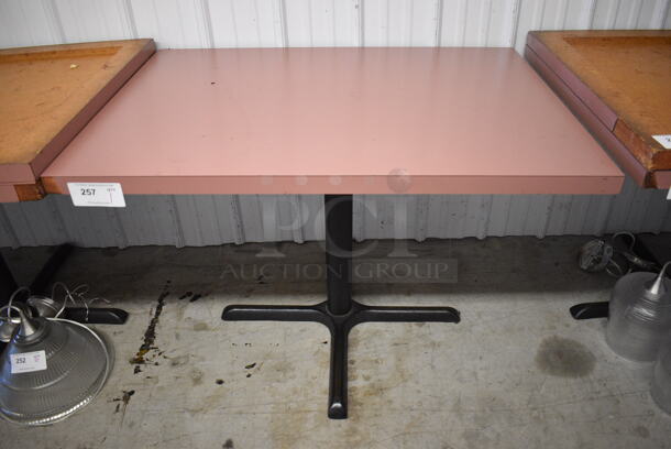 Pink Tabletop on Black Metal Table Base. Stock Picture - Cosmetic Condition May Vary. 42x30x29.5
