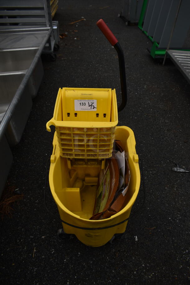 Rubbermaid Yellow Poly Mop Bucket w/ Wringing Attachment on Commercial Casters.
