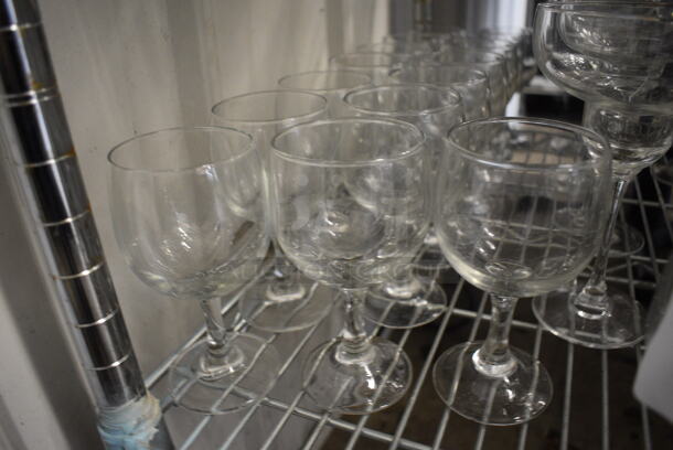 16 Wine Glasses. 3x3x5.5. 16 Times Your Bid!