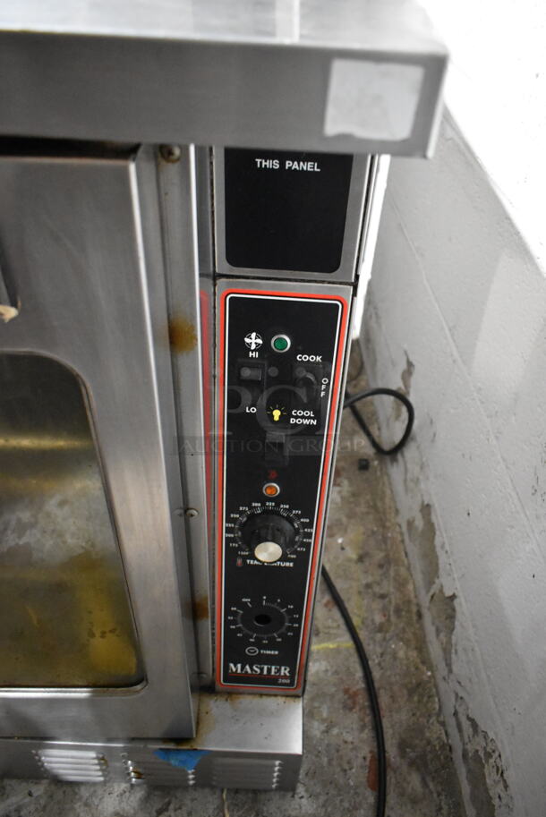 Garland Master 200 Stainless Steel Commercial Natural Gas Powered Full Size Convection Oven w/ View Through Doors, Metal Oven Racks and Thermostatic Controls.  - Image 2 of 4