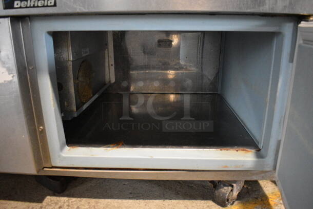 Delfield Stainless Steel Commercial Single Door Chef Base on Commercial Casters. 47x35x24. Tested and Powers On But Does Not Get Cold - Image 3 of 3