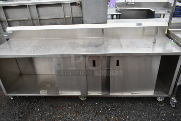 Stainless Steel Commercial Table w/ Back Splash, Under Shelf and 2 Doors on Commercial Casters.