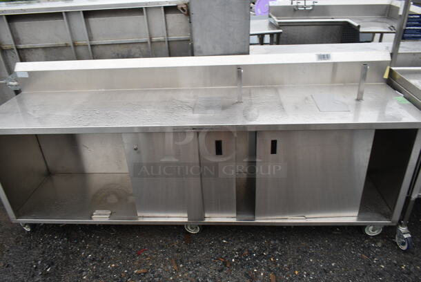 Stainless Steel Commercial Table w/ Back Splash, Under Shelf and 2 Doors on Commercial Casters. - Image 1 of 9