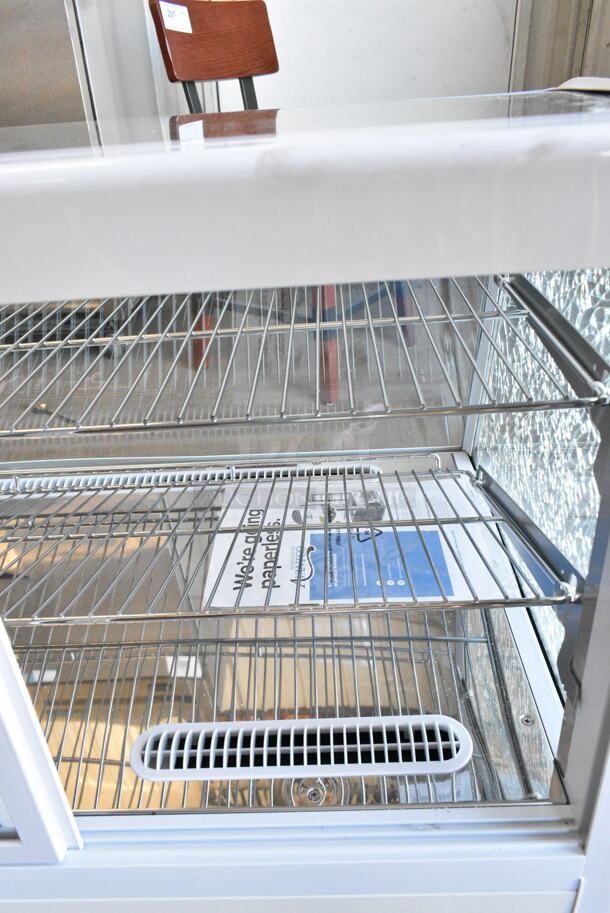 BRAND NEW SCRATCH AND DENT! Avantco 360BCC35HCW 34 1/5" White Refrigerated Countertop Bakery Display Case with LED Lighting. See Pictures for Broken Glass. 115 Volts, 1 Phase. Tested and Working! - Image 8 of 10