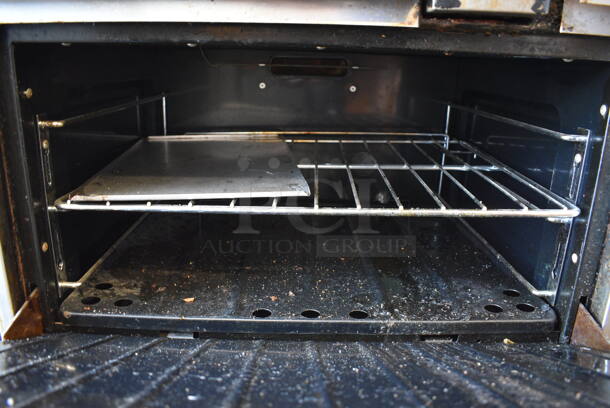 Garland Stainless Steel Commercial Natural Gas Powered Flat Top Griddle, 2 Burner Range, Oven, Over Shelf and Back Splash. 48x33x59.5 - Image 6 of 7