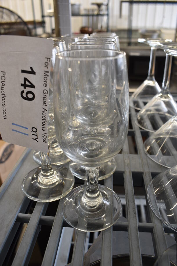 11 Wine Glasses. 2.5x2.5x6. 6 Times Your Bid!