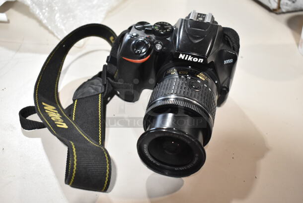 Nikon D3500 Digital Camera w/ Lens and Strap. 