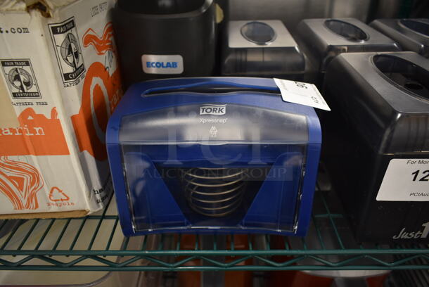 Tork Blue and Clear Poly Napkin Dispenser.  - Image 1 of 3