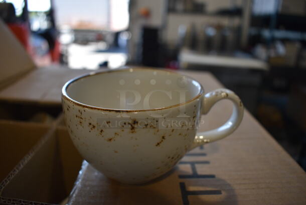 36 BRAND NEW IN BOX! White Ceramic Mugs w/ Brown Specks. 5x3.5x2.5. 36 Times Your Bid! - Image 1 of 3