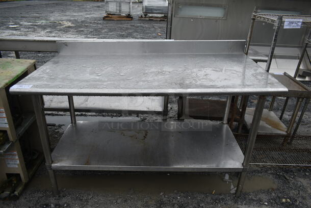 Stainless Steel Commercial Table w/ Back Splash and Under Shelf. - Image 1 of 4