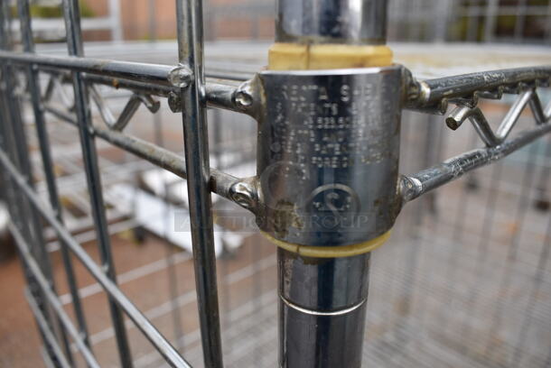 Chrome Finish 4 Tier Wire Shelving Unit on Commercial Casters. BUYER MUST DISMANTLE. PCI CANNOT DISMANTLE FOR SHIPPING. PLEASE CONSIDER FREIGHT CHARGES. 48x24x68 - Image 4 of 5