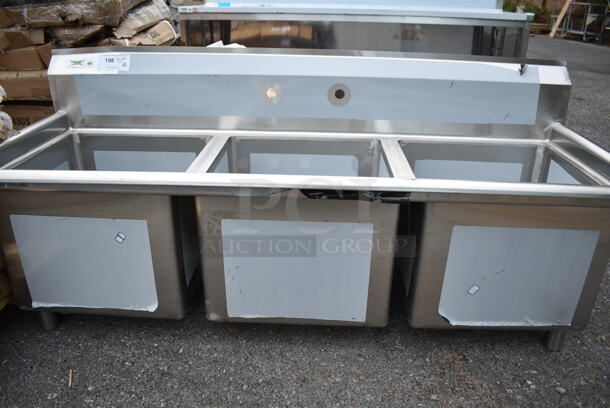 BRAND NEW SCRATCH AND DENT! Regency 600S31818 63" 16 Gauge Stainless Steel Three Compartment Commercial Sink with Stainless Steel Legs and Cross Bracing - 18" x 18" x 14" Bowls. No Legs.  - Image 3 of 7