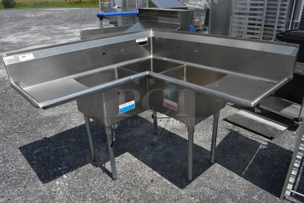 Stainless Steel Commercial L Shaped 3 Bay Sink w/ Dual Drainboards. 58x58x47. Bays 18x18x11. Drainboards 17x20x1