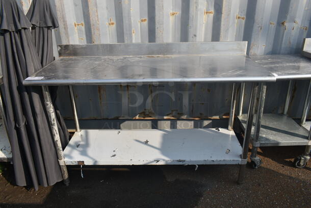 Stainless Steel Commercial Table w/ Back Splash and Under Shelf. - Image 1 of 5