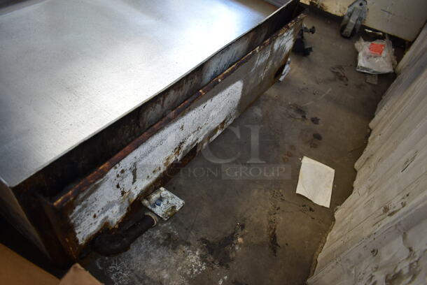 APW Wyott Stainless Steel Commercial Countertop Natural Gas Powered Flat Top Griddle.  - Image 5 of 7