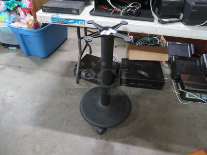 One Pedestal Base On Casters.