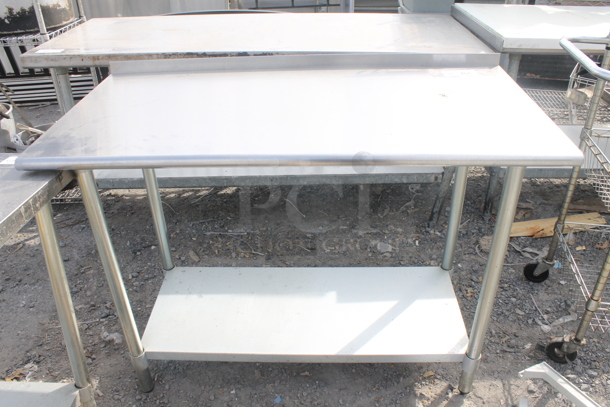 Stainless Steel Table w/ Backsplash and Undershelf - Image 1 of 5